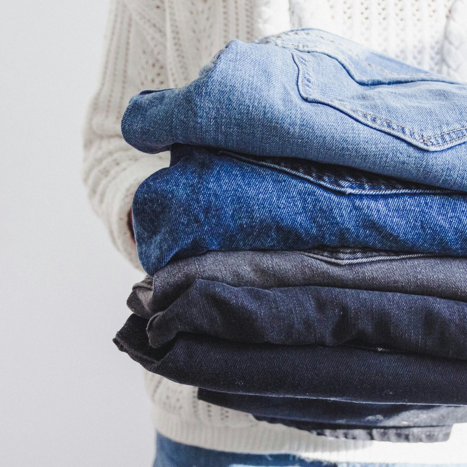 Stack of folded denim jeans